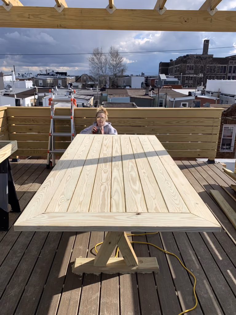 Building the outdoor table on the deck.