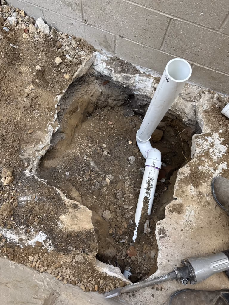 Basement drainage work before the floor was closed.