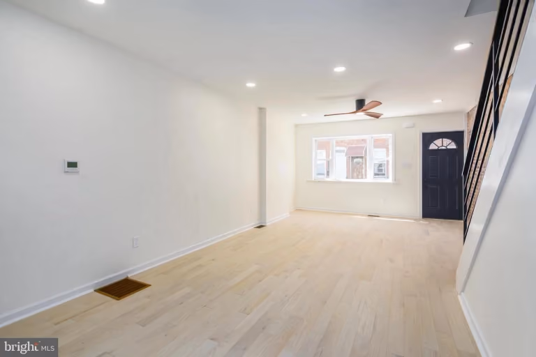 6xx Gerritt St — finished living room / stairs.