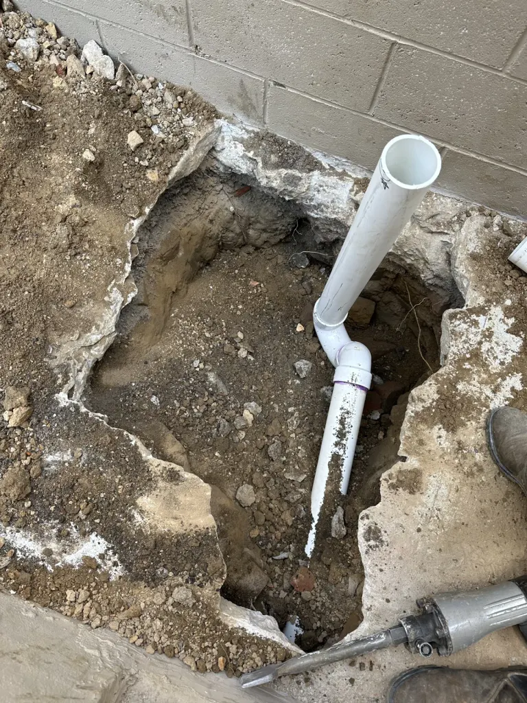 Basement drainage work before the floor was closed.