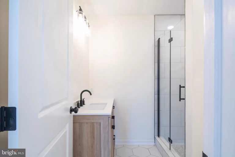 6xx Gerritt St — finished shower bathroom.