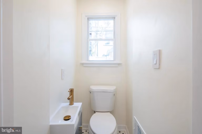 6xx Gerritt St — finished powder room.