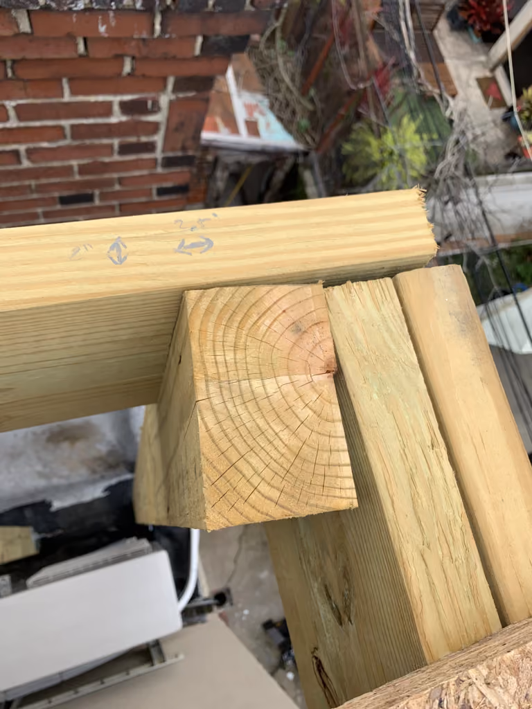A closer view of the timber framing connection.