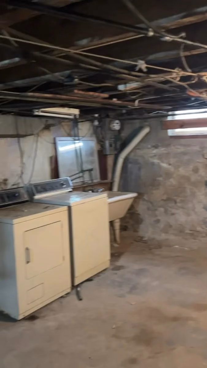 The original basement utility and laundry area.