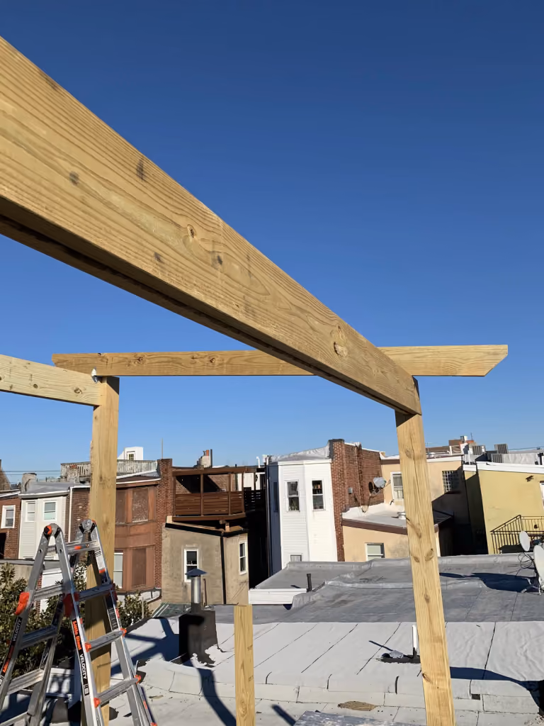 The pergola framing coming together.