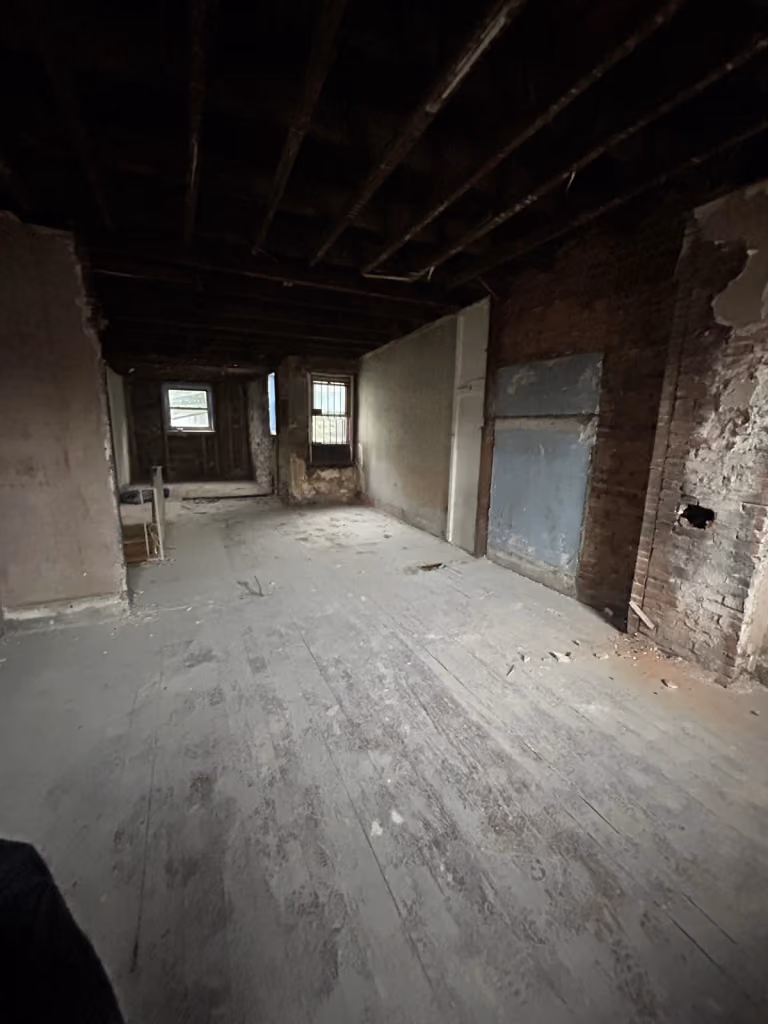 The stripped ground floor, before the new rooms and finishes.