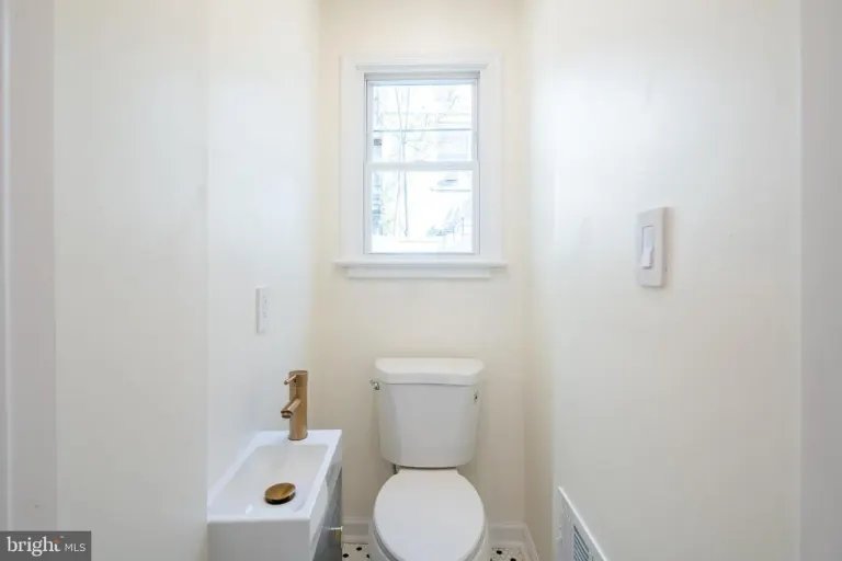 6xx Gerritt St — finished powder room.