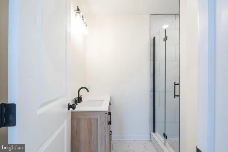 6xx Gerritt St — finished shower bathroom.