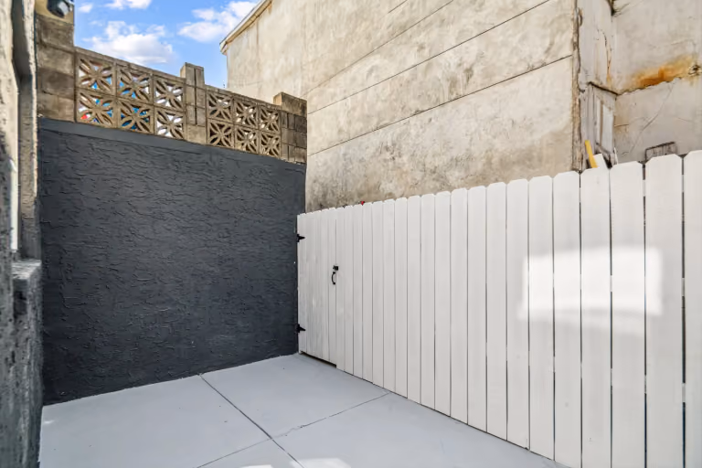 The finished rear courtyard and fence